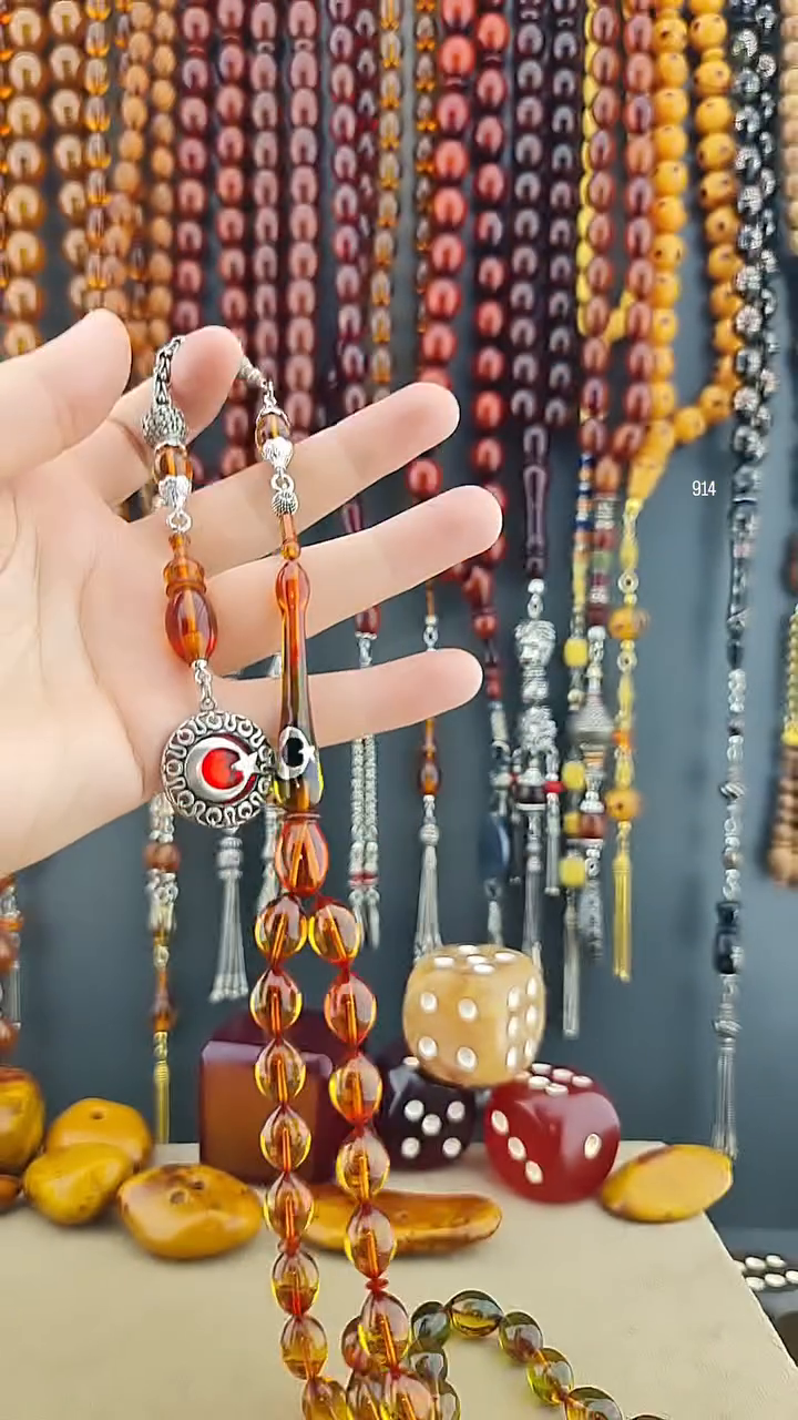 مسبحة كهرمان ناري بإمامة أولتو أكيلدز | شرابة فضة عيار 925